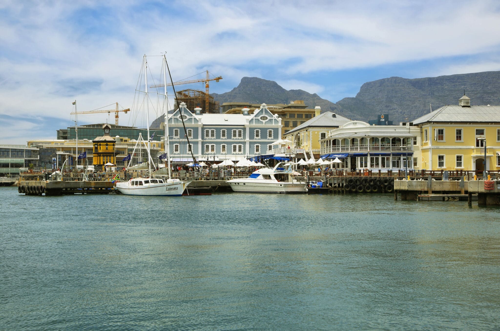 CAPE TOWN,SOUTH AFRICA-DECEMBER, 29:Victoria and Alfred Waterfront, harbor with recreation boats, shops, restaurants and Table Mountain on background on December 7, 2014  in Cape Town, South Africa.